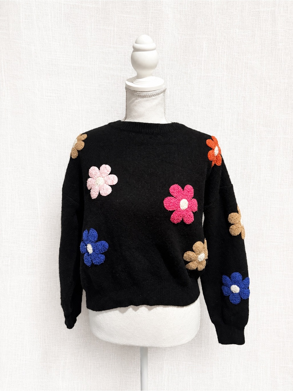 Dreamers Black Sweater with Multicolor Floral Appliqués
